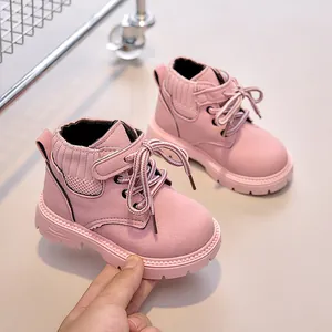 Close-up of pink toddler martin boots with matte finish and non-slip thickened sole