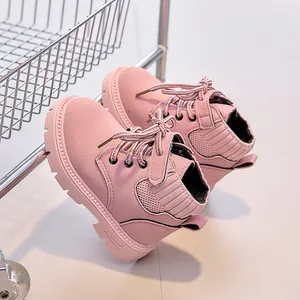 Detail of pink children's boots showing soft suede material and cozy ribbed knit collar