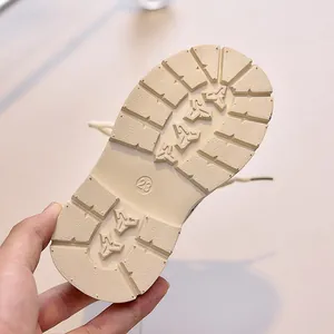 Close-up of durable non-slip rubber sole with size 23 marking for kids boots