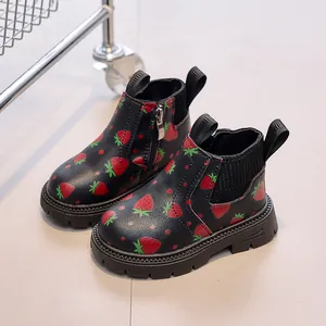 Children's black faux leather boots featuring red strawberry patterns and side zipper