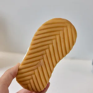 Close-up of non-slip rubber sole with wavy patterns for toddler walking shoes