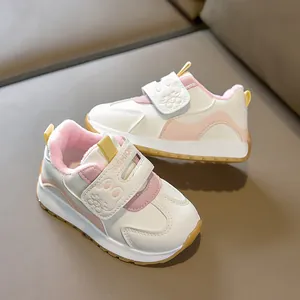 Detail of warm plush lining and cute bunny velcro strap on kids athletic sneakers