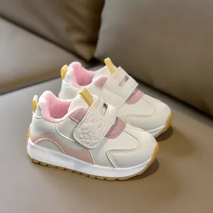Detail of warm plush lining and rabbit velcro closure on toddler winter sneakers