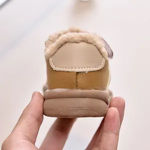 Detailed close-up of winter toddler sneakers with warm plush lining and thick rubber soles