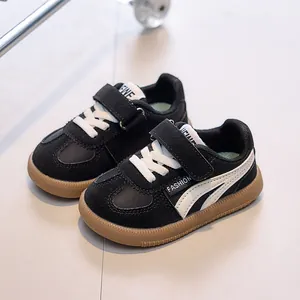Baskets classiques noir et blanc pour enfants avec semelle en gomme et fermeture velcro