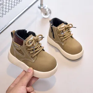 Detail view of khaki children boots featuring side zipper closure and anti-slip thick soles