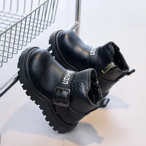 Detail of kids black combat boots with side zipper and thick anti-slip rubber soles