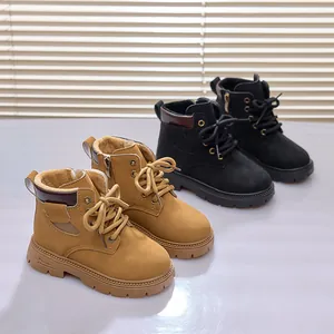 Detail of warm plush lining and durable non-slip rubber sole on kids winter martin boots