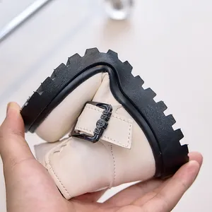 Detail of beige children boot showing ultra-flexible rubber sole for comfort and grip