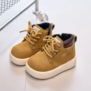 Ginger yellow kids leather boots with white chunky sole and side zipper closure