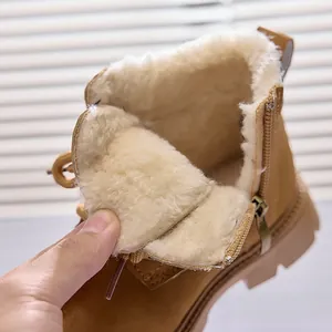 Detailed view of kids winter boots featuring thick warm plush lining and side zipper