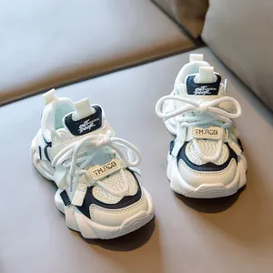 Detail of children's mesh sneakers showing breathable fabric and chunky anti-slip sole