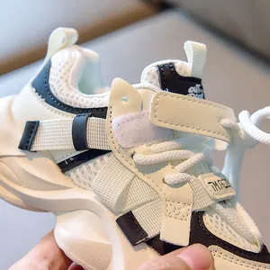 Detail of children's breathable mesh sneaker showing velcro strap and modern sole