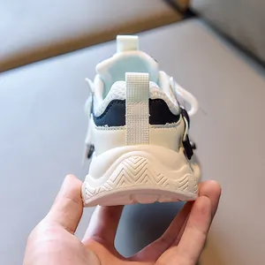 Rear view detail of children's mesh running shoes showing the anti-slip thick wavy sole