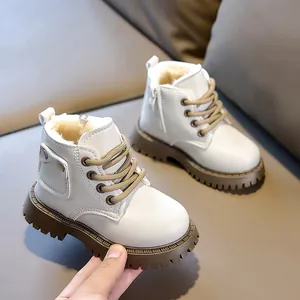 Close-up of children winter boots showing warm faux fleece lining and side zipper detail