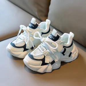 Kids breathable mesh sneakers in black and white chunky sole design for spring