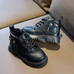 Detail of warm black faux fur lining and non-slip rubber sole of children boots
