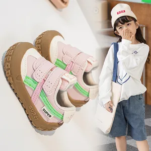 Close-up of pink toddler sneaker with Velcro strap and non-slip rubber sole detail