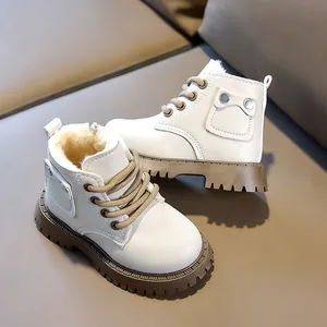 Detail view of kids winter martin boots with warm fleece lining and side zipper