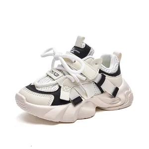 Breathable mesh children sneakers in beige and black with thick cushioned soles