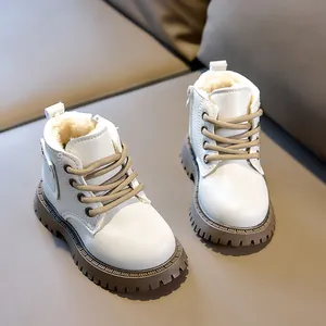 Detail view of children's winter boots with warm fleece lining and side zipper
