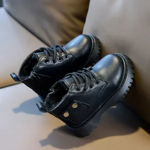Detail view of children's matte black boots with warm fleece lining and side zipper