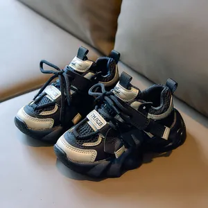 Kids chunky sneakers in black and beige mesh with velcro strap and thick sole