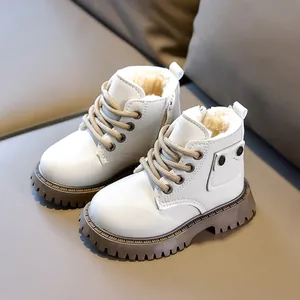 Kids warm winter leather boots with plush lining and non-slip thick soles in beige color