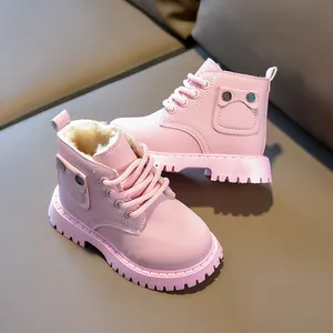 Pink children's winter Martin boots with faux fur lining and decorative side pocket