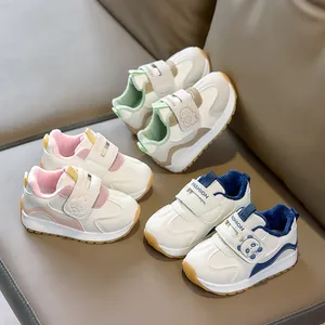 Winter fleece-lined baby sneakers with cartoon dinosaur patches and velcro straps