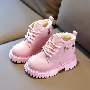 Pink kids' winter boots with cozy faux fur lining and non-slip rubber soles