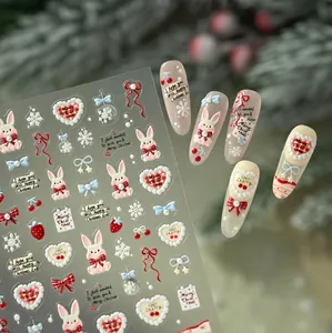 Detailed 3D embossed Christmas nail art stickers featuring cute rabbits and snowflakes