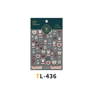 Detailed view of TL-436 Christmas nail art stickers featuring rabbits and red bows
