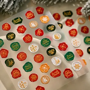3D reliëf kerstnagelstickers met ontwerpen van de kerstman, rendieren en sneeuwvlokken