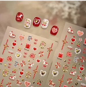 Detailed 3D relief nail stickers featuring red hearts, golden ponies and fireworks designs
