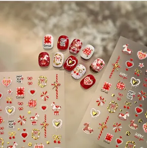 3D relief nail stickers featuring festive red and gold hearts with bowknot details