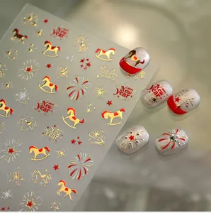 Detail of New Year nail stickers featuring golden horses, fireworks and star patterns