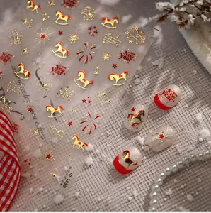 Macro detail of M-1359 New Year nail stickers with laser gold pony and star patterns