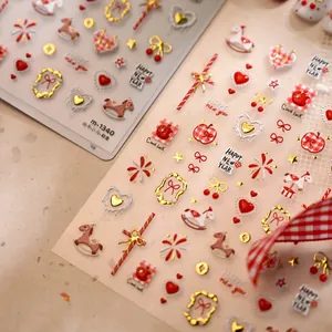 New Year nail stickers set with golden horses and hearts for festive manicure art