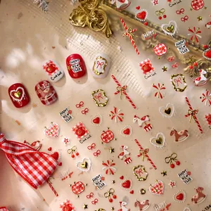 Festive New Year nail stickers with gold horses, hearts, and fireworks pattern