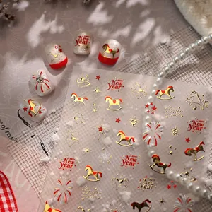 New Year horse nail art stickers with gold fireworks and stars in festive gift setting