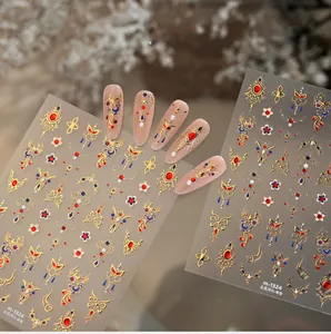 Macro detail of M1324 gold embroidery nail stickers with traditional Chinese butterfly motifs