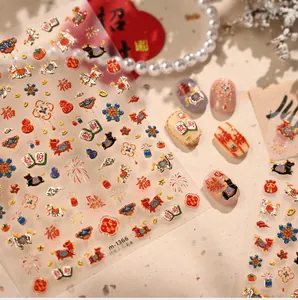 Macro detail of M1366 Chinese New Year nail art stickers with gold pony and lantern motifs