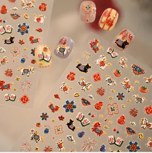 Macro detail of Chinese New Year nail stickers featuring red koi and mahjong patterns