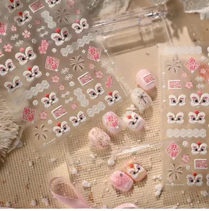 Detail of 3D embossed pink lion dance nail stickers with fireworks and floral patterns
