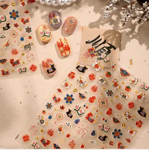 Detail of Lunar New Year nail art stickers with gold embossed horse and fortune icons