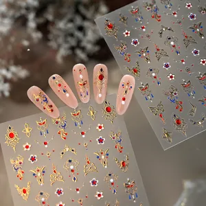 Traditional Chinese style nail stickers with gold phoenix and floral embossed patterns