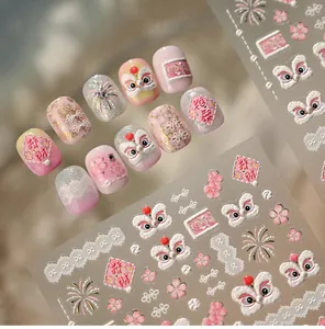 Close-up of 5D embossed nail stickers featuring pink lion dance and firework motifs