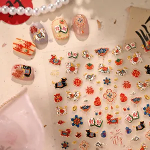 Chinese New Year nail art stickers featuring red zodiac horse and lucky gold patterns