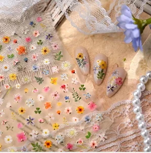 Detail of floral nail art stickers m-1381 with vintage lace and pearl decorations
